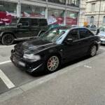 Mitsubishi Lancer Evolution VI: The Rally Legend with Iconic Spoiler and Turbocharged Power